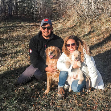 Owners Toni and rob With their Dogs. They started Momentum Carnivore nutrition to provide the best dog and cat treats in the United States. You can trust this family who has your pets best interests in mind.